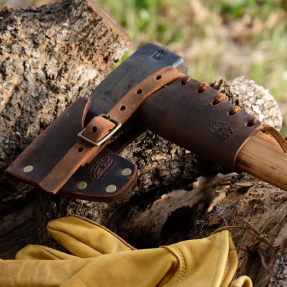Universal Axe Mask made of premium Crazy Horse leather, secured with an adjustable strap on a hatchet.